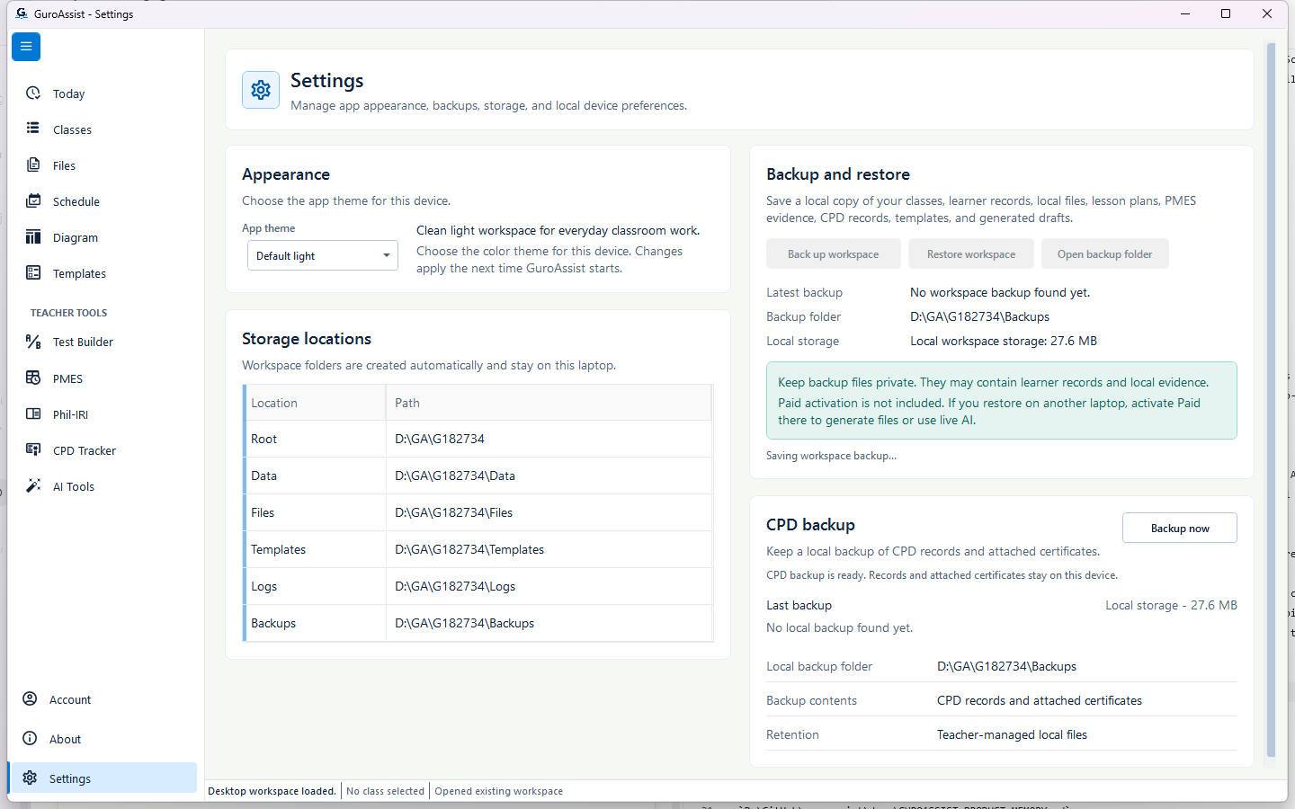 Settings showing Saving workspace backup while the backup and restore actions are disabled.